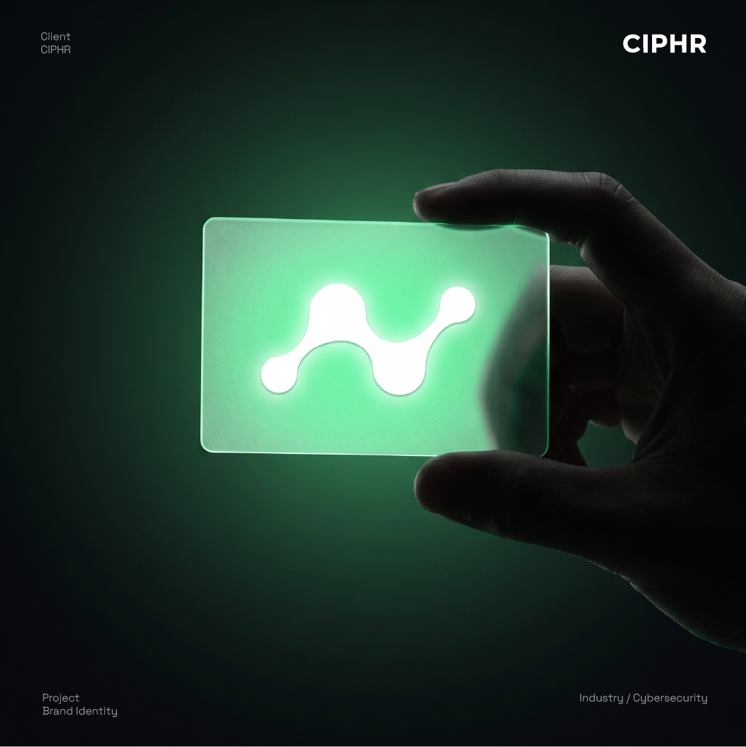 ไอคอน metaball ของ CIPHR เรืองแสงสีเขียวบนแผ่นใส